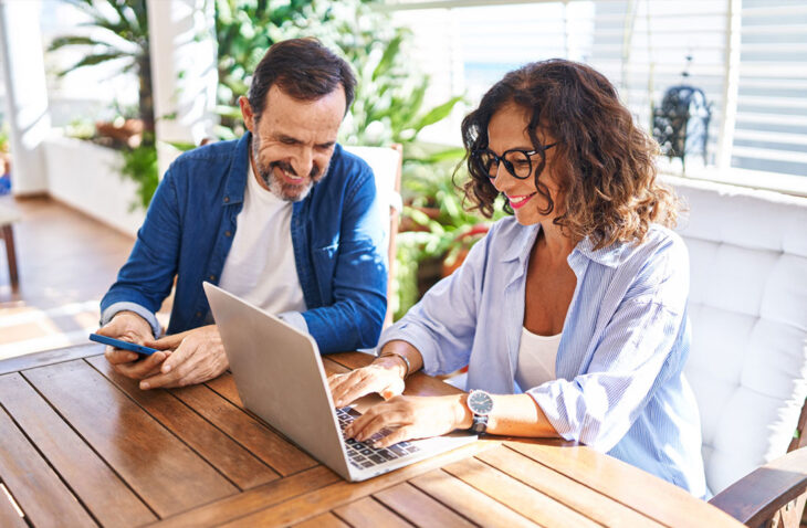 couple looking at laptop