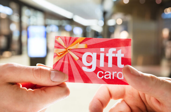 gift card being handed off to someone else