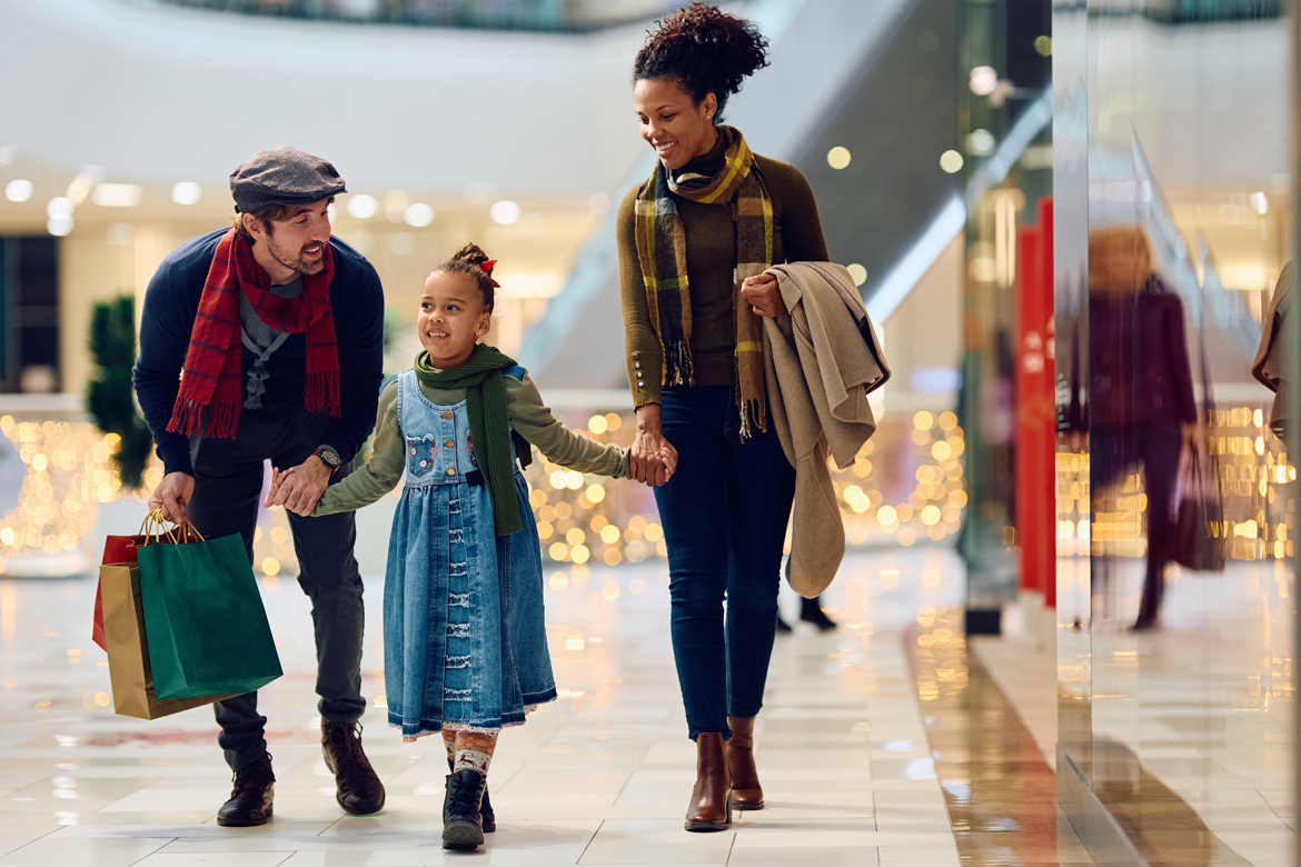 family walking around a shopping mall